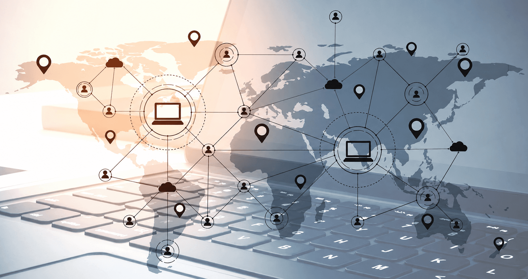 A world map of connected devices above a laptop keyboard